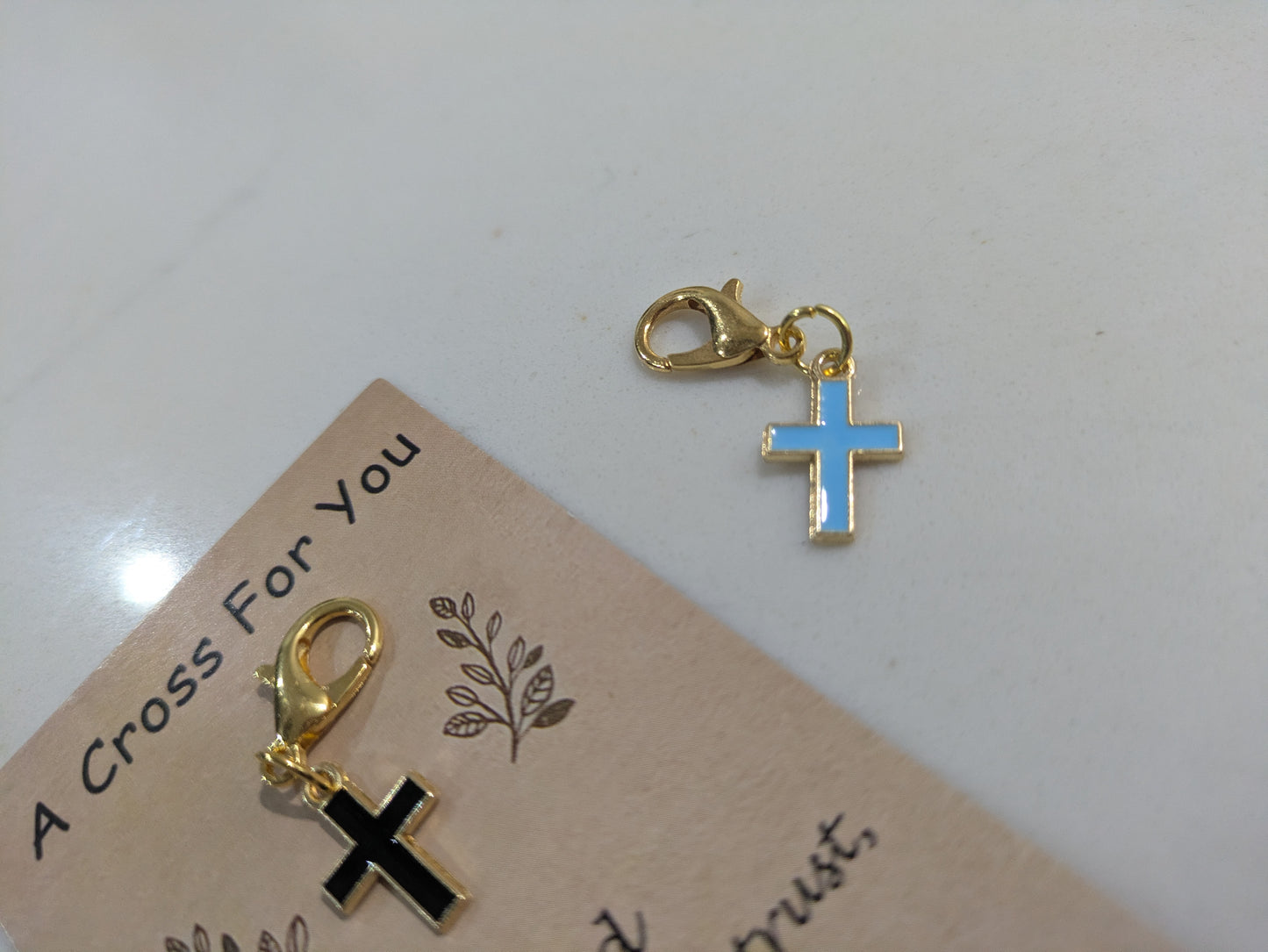 Cross charms with clasps