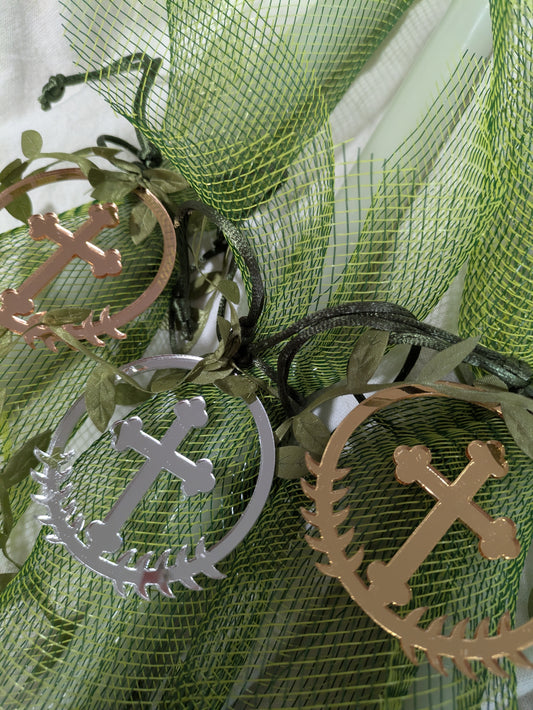 Budded cross hanging